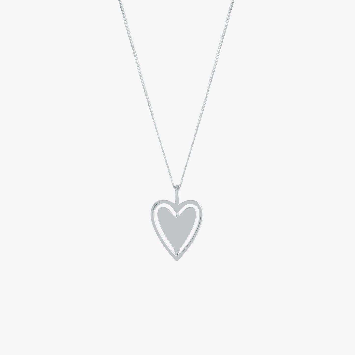 Spinning Around Heart Necklace in Silver